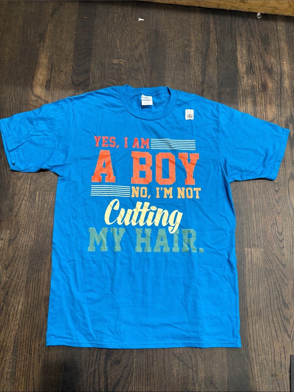 Gildan Bright Blue Graphic Tee with Orange, Yellow and Green Text